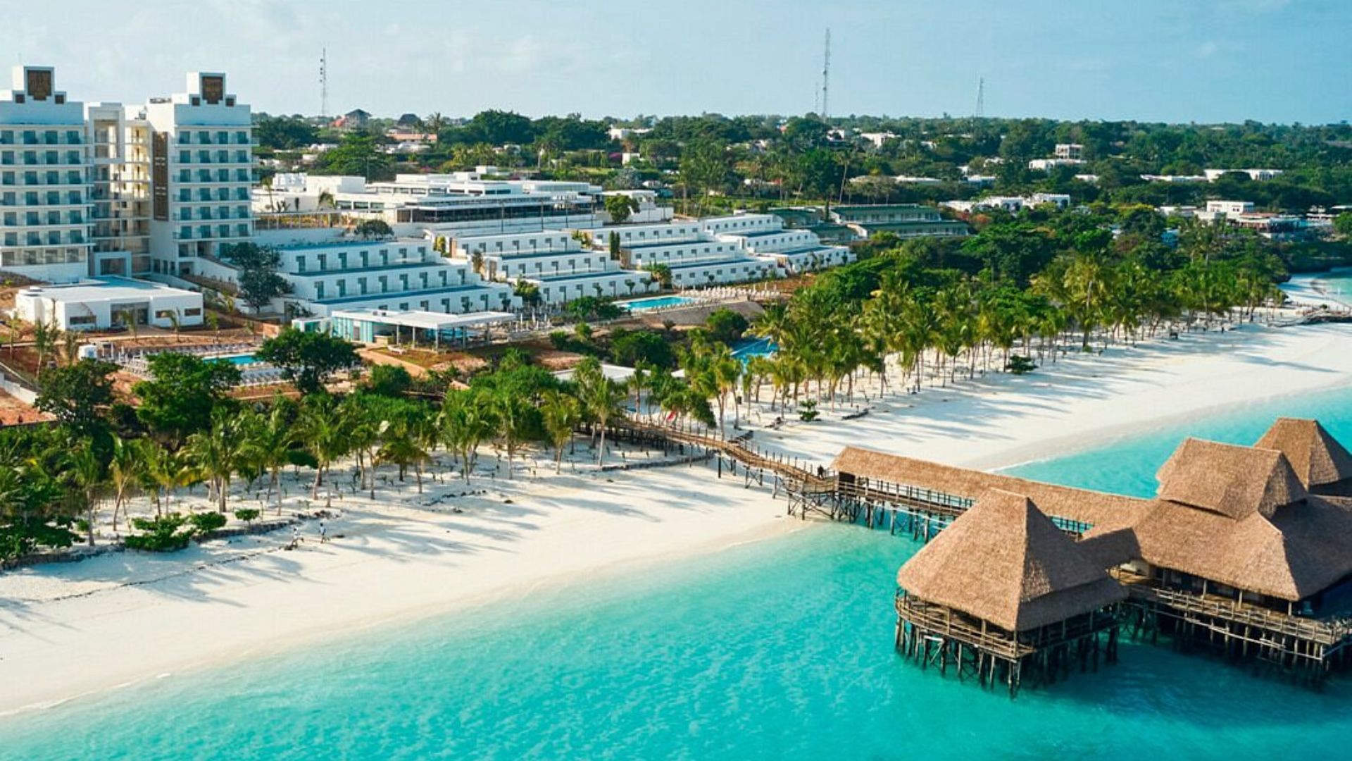 Riu Jambo: A modern all-inclusive resort located in Nungwi, offering comfortable accommodations, multiple dining options, a swimming pool, and direct beach access.