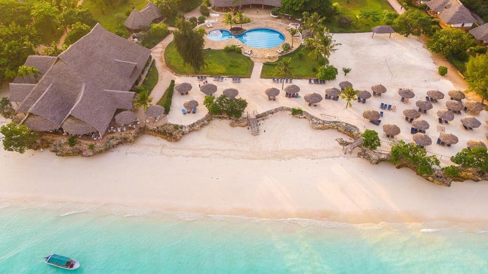 Sandies Baobab: A charming beach resort in Nungwi with a laid-back vibe, comfortable accommodations, a beachfront bar, and easy access to water sports activities.