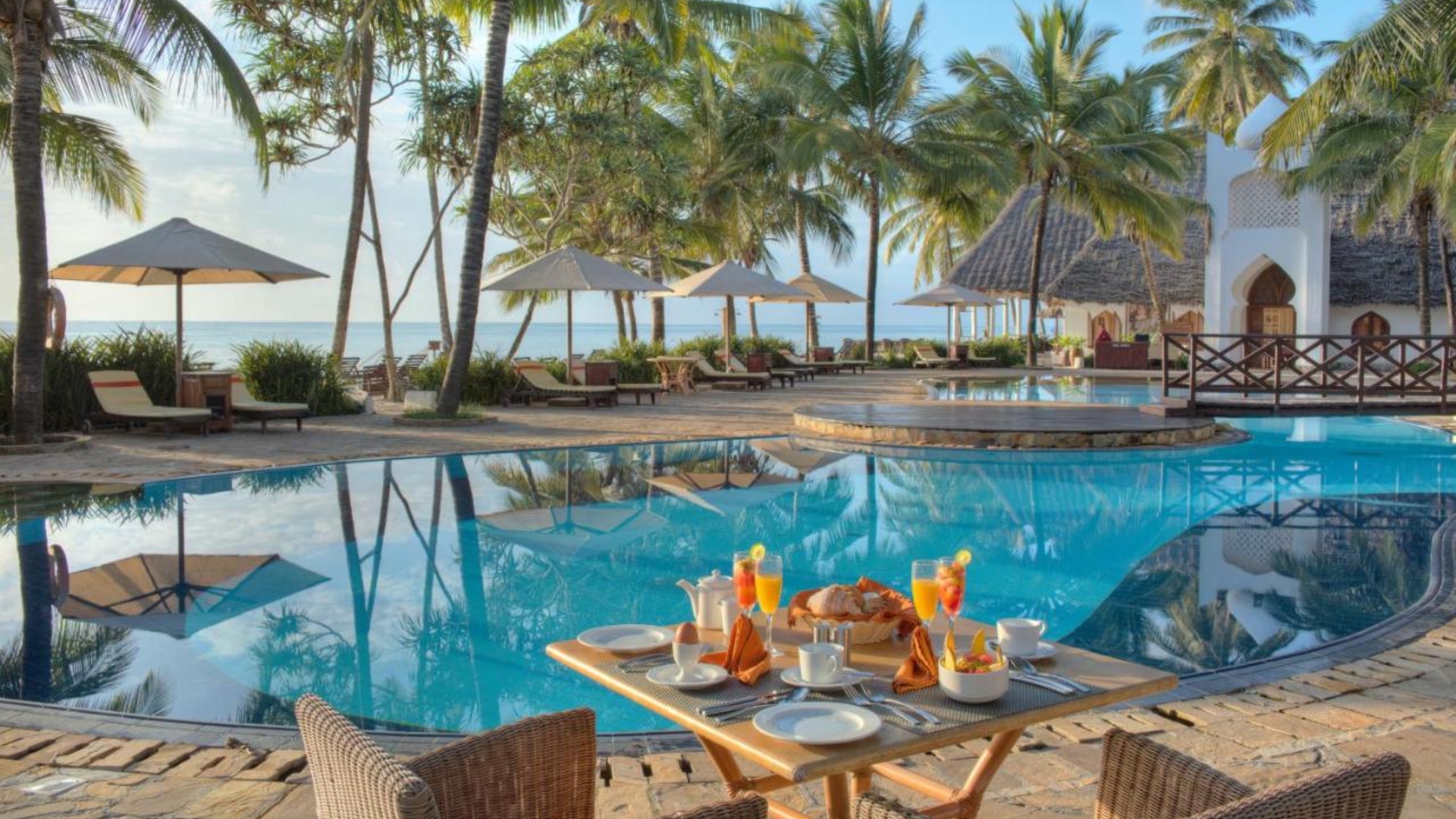 Sultan Sands Island Resort: A beachfront property with traditional Swahili-style accommodations, a swimming pool, water sports facilities, a restaurant, and a relaxing atmosphere.